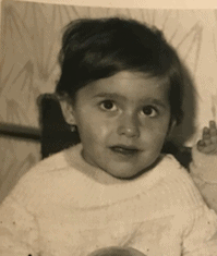 Image of MARIKA KOVALCIKOVA Development Manager, when she was a baby, looking at the camera.