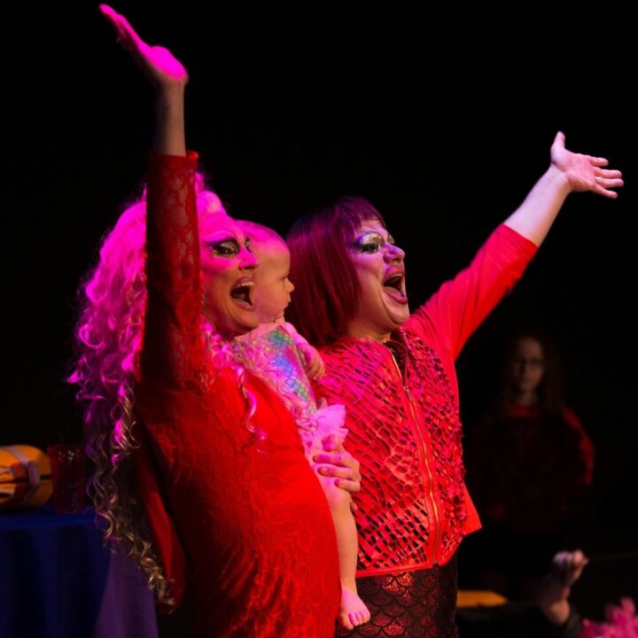 Photo of drag performers waving and smiling, from the Parents are still a drag performance taking place June 3rd-5th