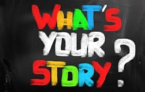 ‘What’s Your Story?’ written in different colours on a chalkboard