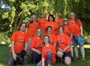 Group of people wearing orange shirts for the First Nation Day for Truth and Reconciliation, 2021
