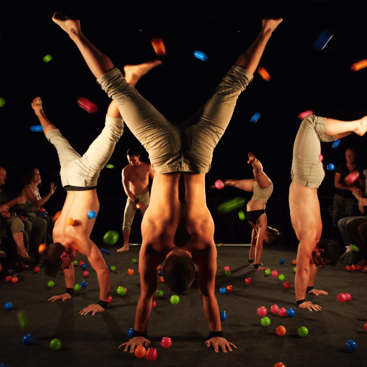 4 Performers doing handstands