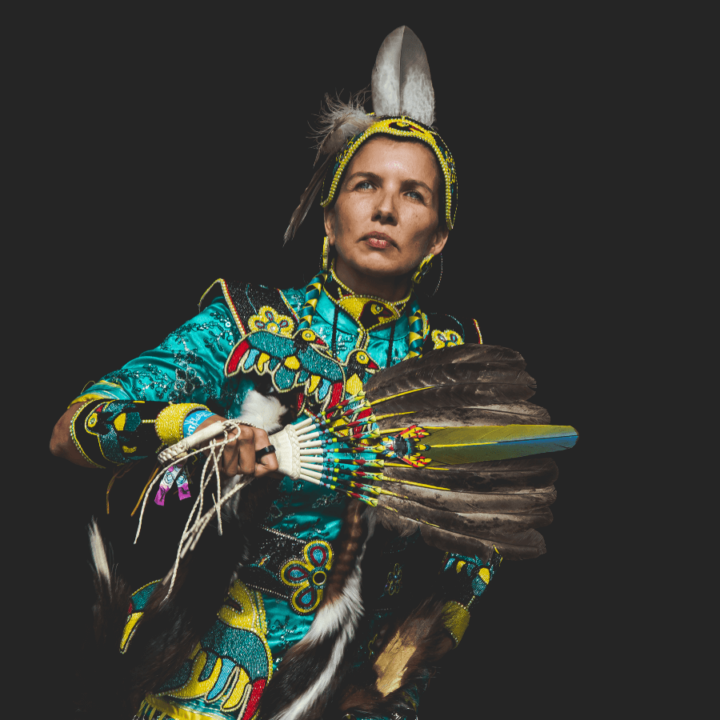 one of the dancers from the dance group The Wild Moccasin Dancers, wearing Indigenous regalia