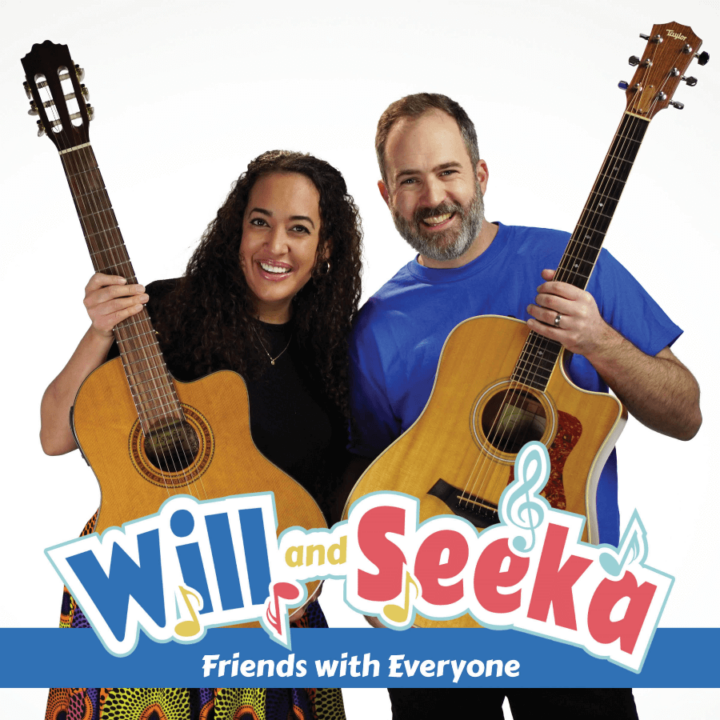 Will and Seeks standing beside each other holding a guitar, with text on the bottom saying Will and Seeka Friends with Everyone