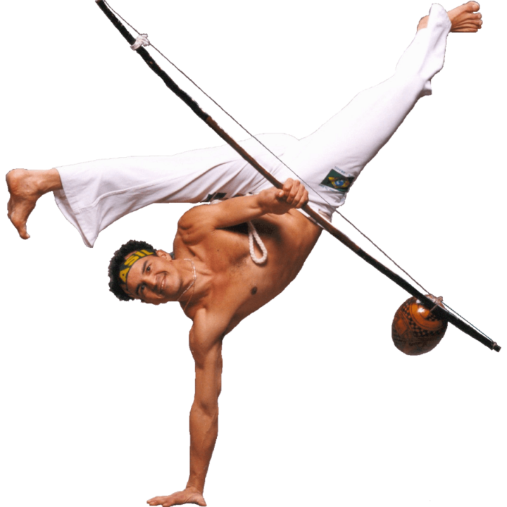 a man balancing on one hand while doing the splits in the air while holding an instrument
