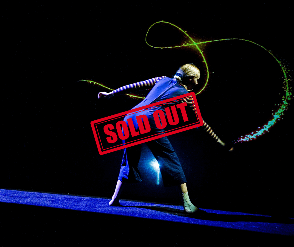 performer for the show ZOOOM, in a dark room creating colorful glow in the dark lines. There is large red text over the image, displaying that the show is sold out.